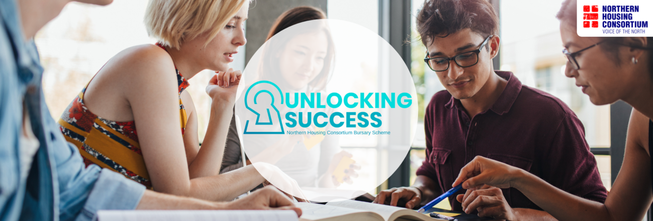 Group of people sat around a table with unlock success logo in middle
