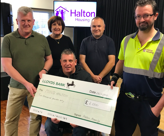 Halton Housing, Mind Halton and Proud2BSafe with the cheque