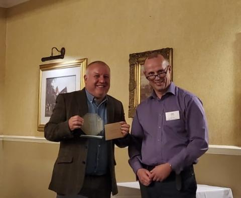 Jon Blackwell receiving award